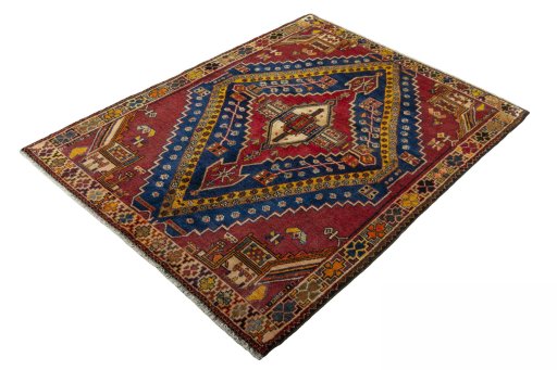 Corner detail of 2000s Shiraz rug showing border pattern and Wool pile