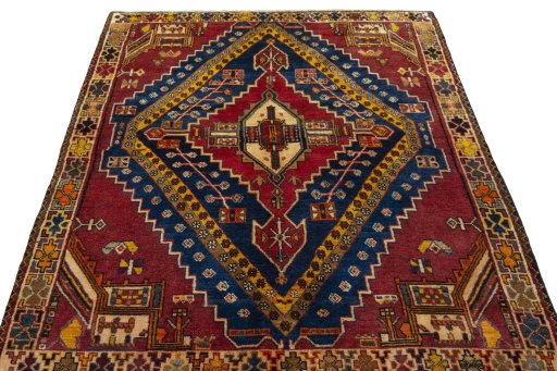 Surface texture of 2000s Shiraz rug with natural Wool and intricate pattern