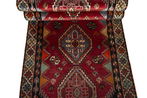 Full view of 2000s Shiraz rug from Iran / Persia, 273 × 87 cm in Red tones