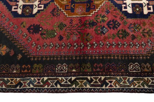 Close-up detail of 2000s Shiraz rug from Iran / Persia showing Wool weave