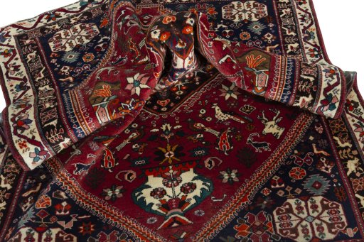 Surface texture of 2000s Shiraz rug with natural Wool and intricate pattern