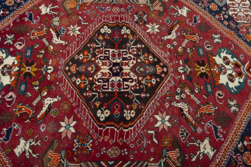 Central medallion detail of 2000s Shiraz rug from Iran / Persia
