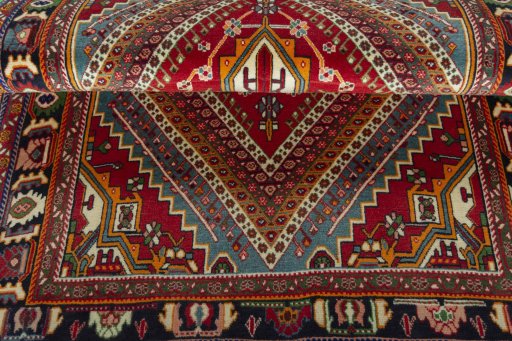 Corner detail of 1970s Shiraz rug showing border pattern and Wool pile