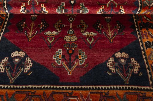 Full view of 2000s Shiraz rug from Iran / Persia, 182 × 120 cm in Red tones