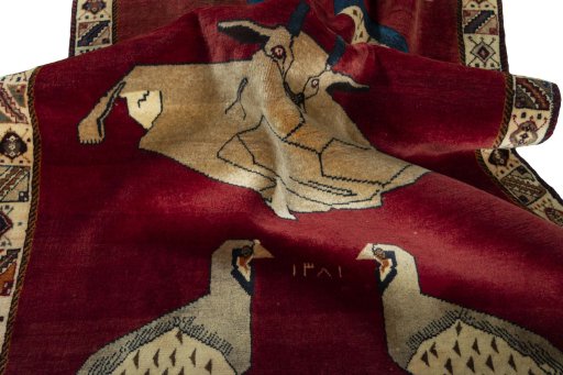 Corner detail of 2000s Shiraz rug showing border pattern and Wool pile