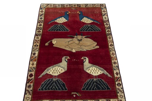Surface texture of 2000s Shiraz rug with natural Wool and intricate pattern