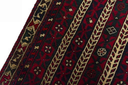 Backside of handmade 2000s Shiraz rug showing knot structure and weave density
