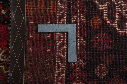Surface texture of 1970s Shiraz rug with natural Wool and intricate pattern