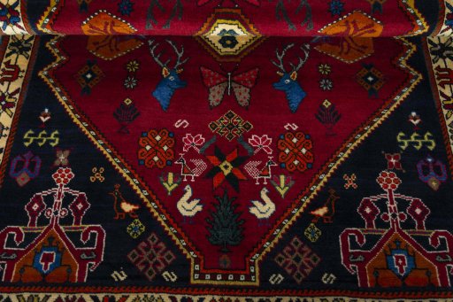 Corner detail of 2000s Shiraz rug showing border pattern and Wool pile