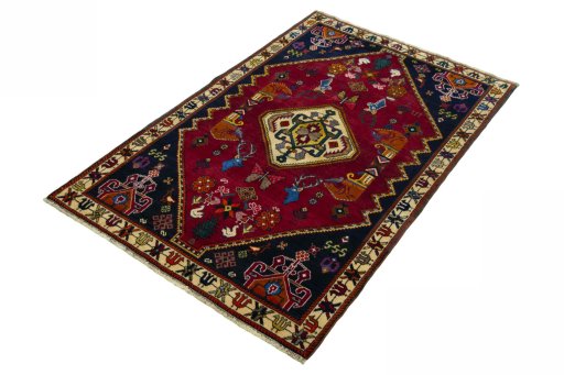 Corner detail of 2000s Shiraz rug showing border pattern and Wool pile