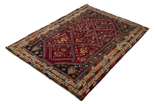 Corner detail of 2000s Shiraz rug showing border pattern and Wool pile
