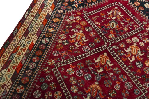 Backside of handmade 2000s Shiraz rug showing knot structure and weave density