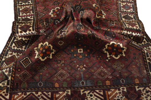 Corner detail of 1970s Shiraz rug showing border pattern and Wool pile