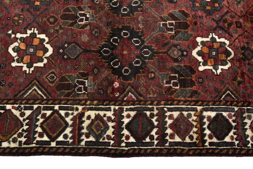 Close-up detail of 1970s Shiraz rug from Iran / Persia showing Wool weave