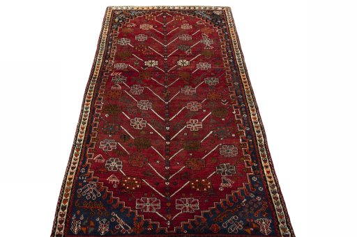 Surface texture of 2000s Shiraz rug with natural Wool and intricate pattern