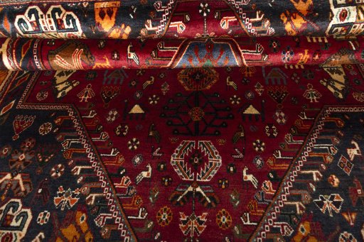 Full view of 2000s Shiraz rug from Iran / Persia, 265 × 170 cm in Red tones