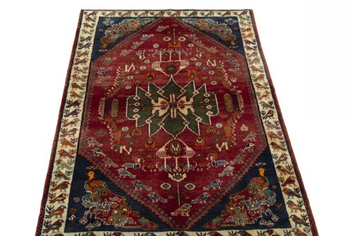 Surface texture of 2000s Shiraz rug with natural Wool and intricate pattern