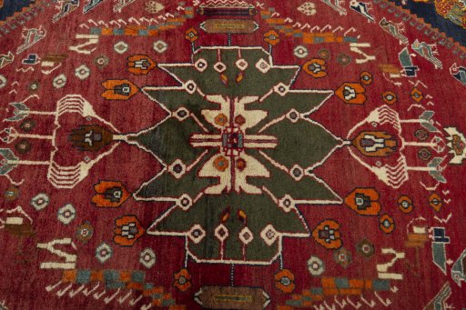 Central medallion detail of 2000s Shiraz rug from Iran / Persia
