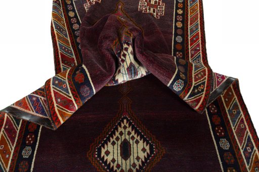 Corner detail of 1970s Shiraz rug showing border pattern and Wool pile
