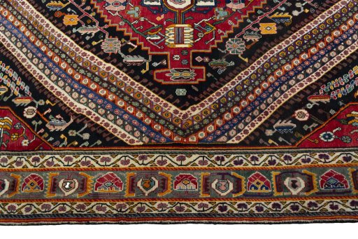 Corner detail of 1970s Shiraz rug showing border pattern and Wool pile