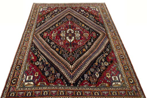 Surface texture of 1970s Shiraz rug with natural Wool and intricate pattern