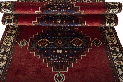 Full view of 2000s Shiraz rug from Iran / Persia, 313 × 105 cm in Red tones