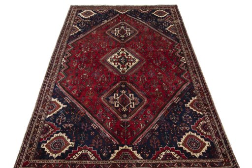 Surface texture of 2000s Shiraz rug with natural Wool and intricate pattern