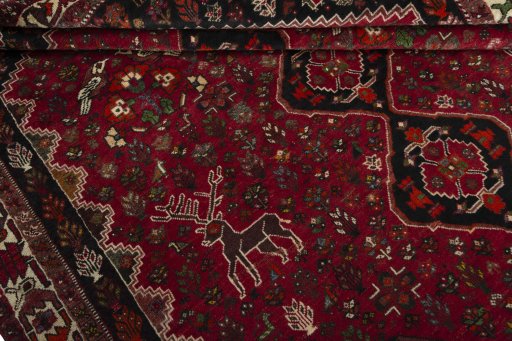 Corner detail of 1970s Shiraz rug showing border pattern and Wool pile