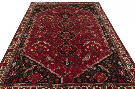 Surface texture of 1970s Shiraz rug with natural Wool and intricate pattern
