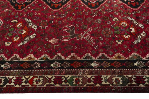 Full view of 1970s Shiraz rug from Iran / Persia, 315 × 222 cm in Red tones