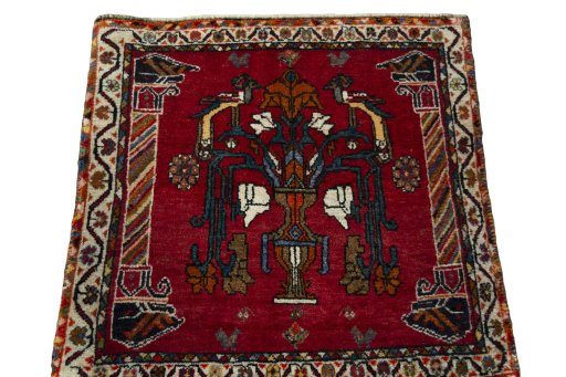 Surface texture of 2000s Shiraz rug with natural Wool and intricate pattern
