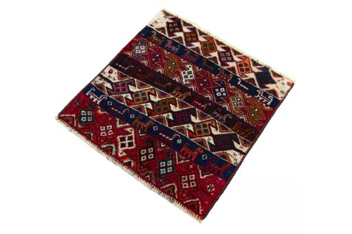 Corner detail of 2000s Shiraz rug showing border pattern and Wool pile