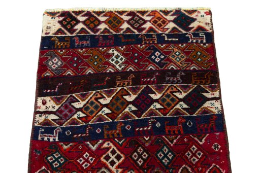 Surface texture of 2000s Shiraz rug with natural Wool and intricate pattern