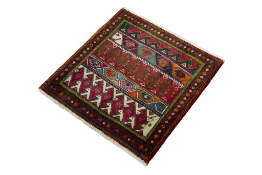 Corner detail of 2000s Shiraz rug showing border pattern and Wool pile
