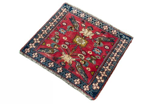 Corner detail of 2000s Shiraz rug showing border pattern and Wool pile