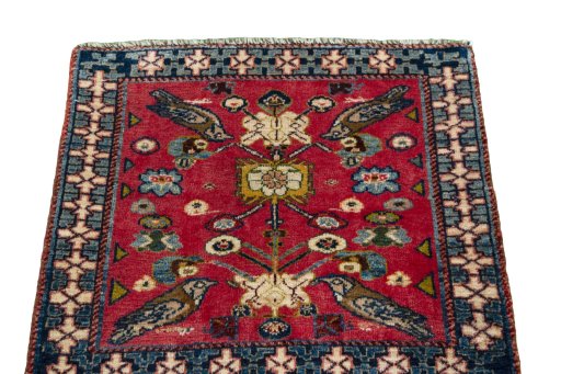 Surface texture of 2000s Shiraz rug with natural Wool and intricate pattern