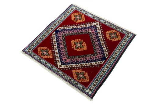 Corner detail of 2000s Shiraz rug showing border pattern and Wool pile