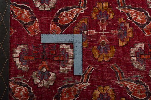 Backside of handmade 2000s Shiraz rug showing knot structure and weave density