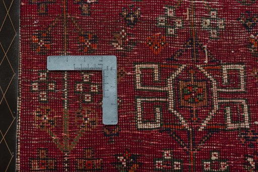 Backside of handmade 2000s Shiraz rug showing knot structure and weave density