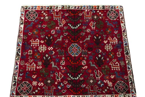 Surface texture of 2000s Shiraz rug with natural Wool and intricate pattern
