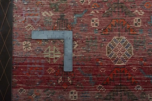 Backside of handmade 2000s Shiraz rug showing knot structure and weave density