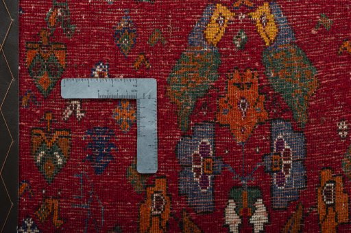 Backside of handmade 2000s Shiraz rug showing knot structure and weave density