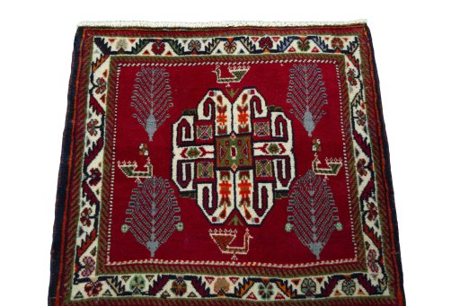 Surface texture of 2000s Shiraz rug with natural Wool and intricate pattern