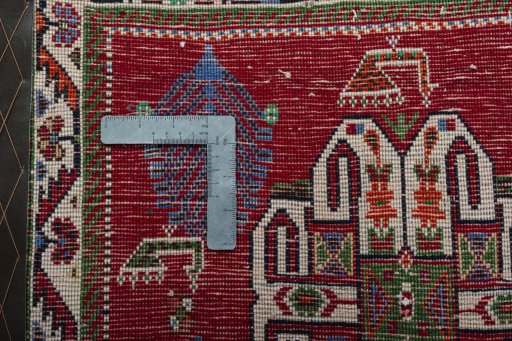 Backside of handmade 2000s Shiraz rug showing knot structure and weave density