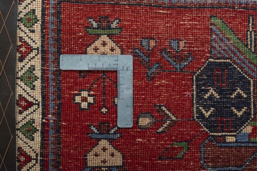 Backside of handmade 2000s Shiraz rug showing knot structure and weave density