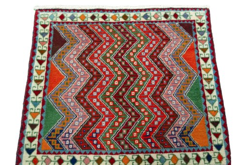 Surface texture of 2000s Shiraz rug with natural Wool and intricate pattern