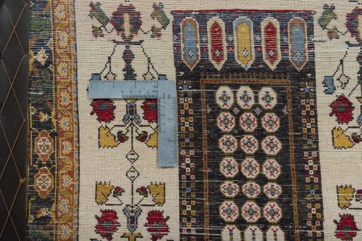 Full view of 2000s Shiraz rug from Iran / Persia, 95 × 59 cm in Multi Color tones