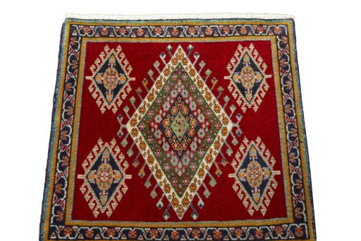 Surface texture of 2000s Shiraz rug with natural Wool and intricate pattern