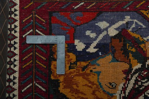 Backside of handmade 2000s Shiraz rug showing knot structure and weave density