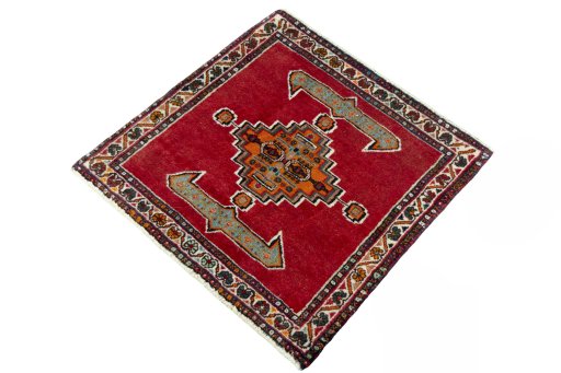 Corner detail of 2000s Shiraz rug showing border pattern and Wool pile